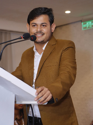 Kavi Sajal Jain performing on stage