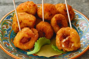 Carrubbeḍḍe siciliane: Un antipasto squisito e filante