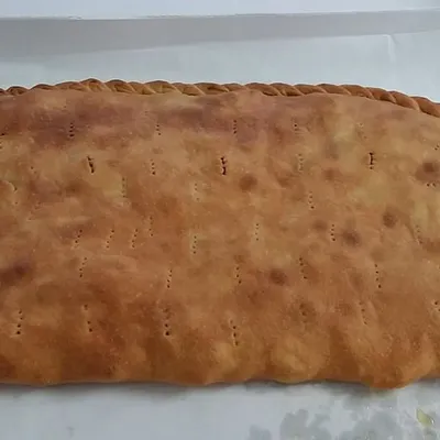 Cuḍḍuruni di Lentini con broccoletti: la focaccia rustica siracusana