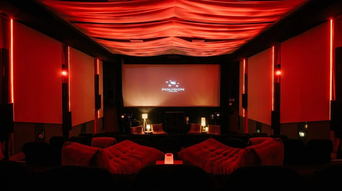 The Polygon Portal listening room in Soho, lit in red with seating arranged beneath its spatial-audio speaker system
