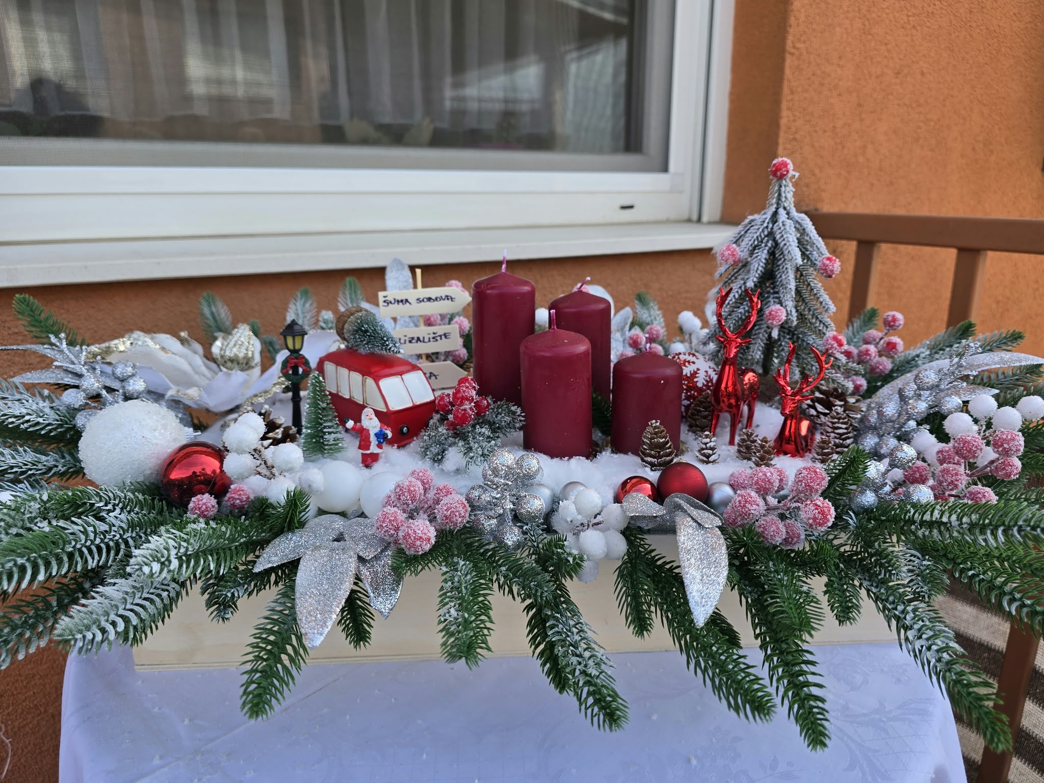 Extra large advent centrepiece Christmas Fairytale with red reindeer and four candles