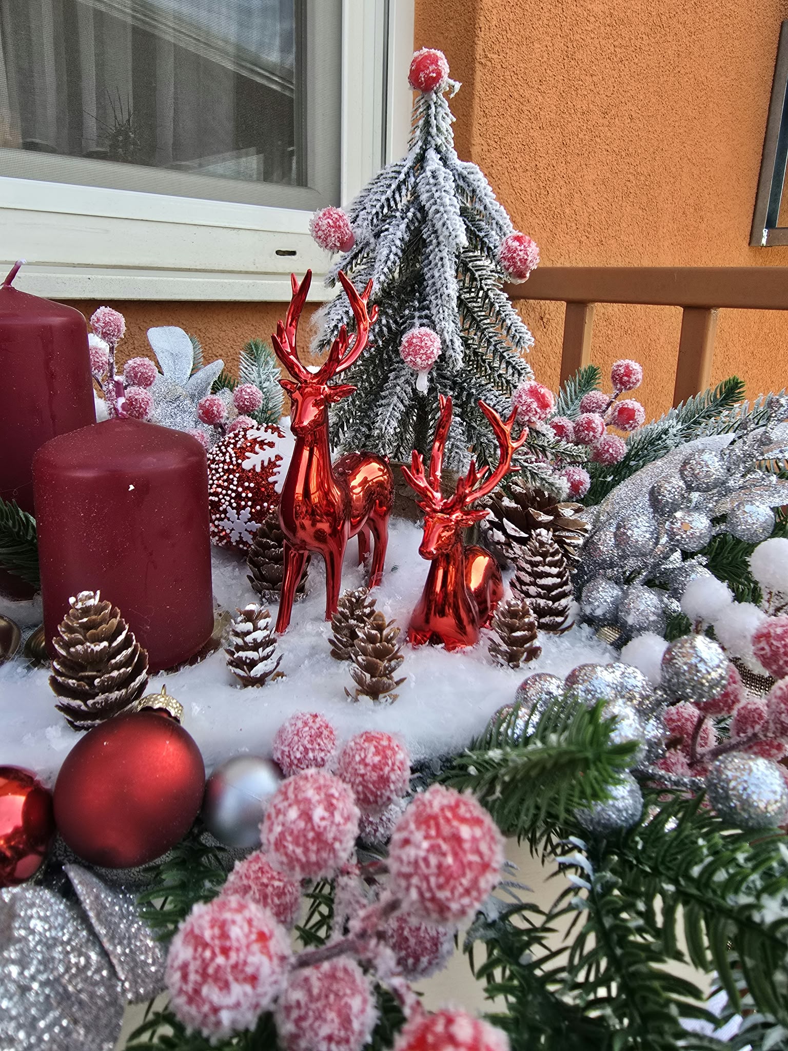 Detail of wooden signposts and snowy fir trees on the centrepiece