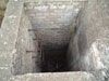 Looking down into the escape with its steel ladder rungs still in place.