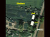 This part of the instructional site with an AML Teacher, a hut with several more hut bases around and some blast shelters.
