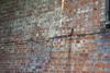 Electrical cables running along the wall.