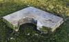 Concrete slab for a perimeter track light.