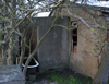 It looks as though an attached toilet added. It looks as though somebody has tried to turn it into a bathroom?.