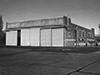 'C' type 1930's with less sections in it used again as a repair shed. A good example is RAF Hullavington.