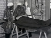 Nurses working on patients in training.