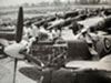 Spitfires around D-day and a Lancaster under repair.