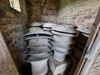Gymnasium asbestos air vents in storage.