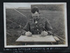Army Liaison officer checking the scores.