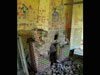 Sergeants mess fire place with art on the wall.