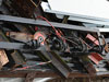 The electric insulators that were so prominent on the left side door supports..
