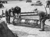 Incendiary carrier to fit into a bomb bay.