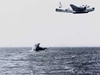 Bombing a towed sea target.