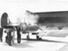 A Spitfire at a cannon test butt showing how much bugger a cannon butt was.