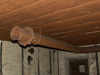 Air pipes in the other room with hoops holding them up to the ceiling.