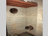 Inlet & outlet for the smoke to be removed from the gun room. There would have been a large electric fan placed here.