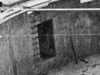The entrance with steel ladder rungs up to the next level.
    A then & now moment.