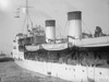 HMS Princess Josephine Charlotte with  LCA's on her davits.
