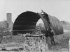 Building a Nissen hut.
