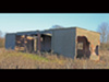 Now very derelict, the shooting butt end with the two sheds either end to hold the range staff.