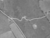 This is a 1947 air-photo of the Kabelbrünen and I think the thin white line (I have enhanced it) of the cable trench. The trenches were not laid in a straight line but zigzagged to allow for stretch in the wire if a shell or bomb exploded near by.