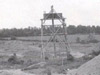There was a wooden water tower, built to hold water fro the building process. It could and seems was used as a fire control post. Mirador - Watchtower.