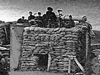 Original fire control using a range-finder surrounded in sand bags.