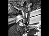 Observer using a scissor range finder.
