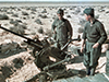 Italian soldiers belonging to an AA unit in the North African desert.