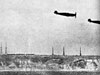 Two Me109's flying past RAF Swingate aerials 1940.