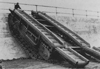 This was used a Churchill with a long bridge. It would drive to the wall and lay the bridge up the wall and another tank can drive over it.