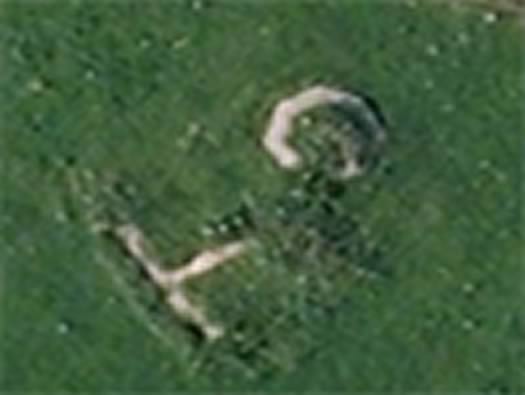 View from the air.
The T shape I believe is an ammunition storage area. Part of the trench system.
