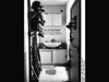 A typical entrance washing area, decontamination and kit storage.