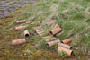 Hand made clay water pipes lying around.