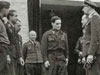 Bader being presented to Galland and other officers at the house at Le Colombier.