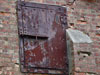 The upper steel door.