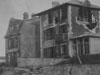 Abandoned and boarded up houses.