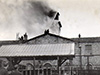 The clock tower, which was a prominent dockyard landmark, was destroyed in hours when it was the victim of a disastrous fire, 30 November, 1944. What started as a minor fire was quickly whipped up by a strong wind into a blaze which also threatened to destroy the dockyard stores building. The building survived, but the clock tower was never replaced.

1944.