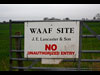 Sign on the gate.