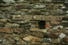 Openings in the wall use lintels made of concrete.