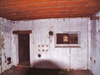 R611 crew room with the second close combat defence embrasure in the wall covering the passage way..