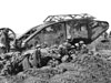 An early model British Mark I male tank, named C-15, near Thiepval, 25 September 1916 with the long barrel.