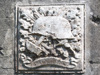 The coat of arms was cut out of the square on the back of the bunker.