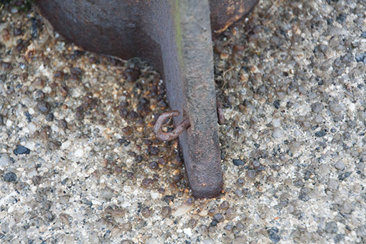 You can just see a small ring where the cable passed through.