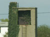 Chimney on the left for the heating plant, water tank is still in the tower, with the ladder to access it.