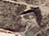It can be seen on this picture above the sand.
