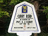 Curry Road, named after Pvt. E. J. Curry of the 519th Port Bt. KIA 10 June 1944.